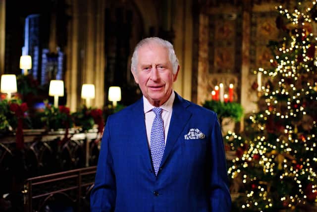 In this image released on December 23, King Charles III is seen during the recording of his first Christmas broadcast in the Quire of St George's Chapel at Windsor Castle, on December 13, 2022 in Windsor, England. (Photo by Victoria Jones - Pool/Getty Images)