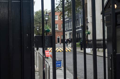 A car has crashed into the gates leading to the British government buildings on Downing Street