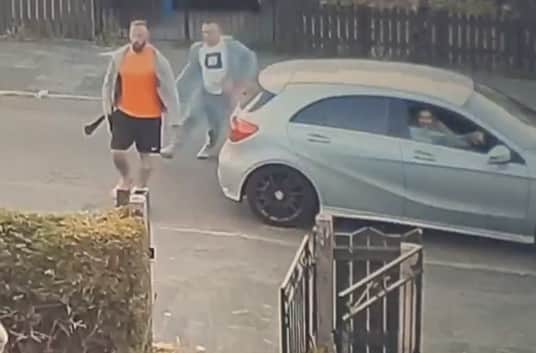CCTV shows the two men chasing a victim while wielding machetes.