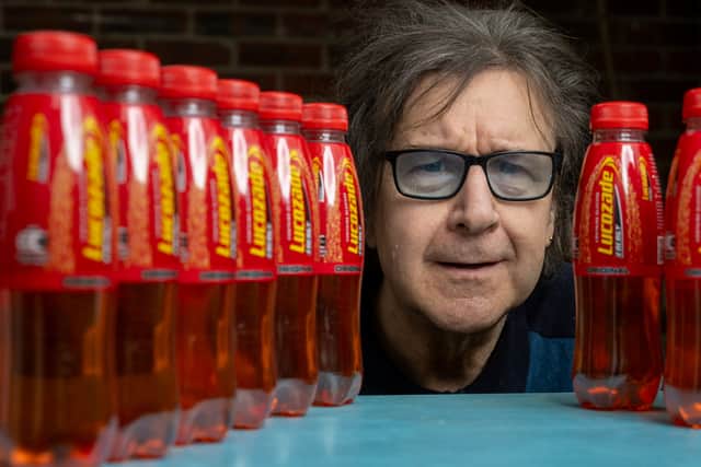Garry Johnson is addicted to Lucozade and drinks 8 bottles of the bright orange drink a day.