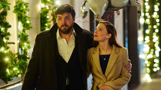 Tom Burke (L) and Holliday Grainger (R) in BBC's Strike.