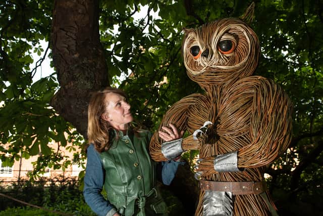 Artist Helena Mellenchip with her fantastical giant owl, at Lytham Hall