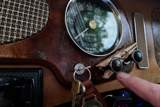 Clothes peg on the choke button, on Dennis Jackson's 1958 Wolesley 1500. Photo Credit: Lucinda Herbert