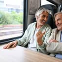 Actor Larry Lamb and his son George Lamb transform travel time on the train into opportunities for meaningful conversations with friends and loved ones.