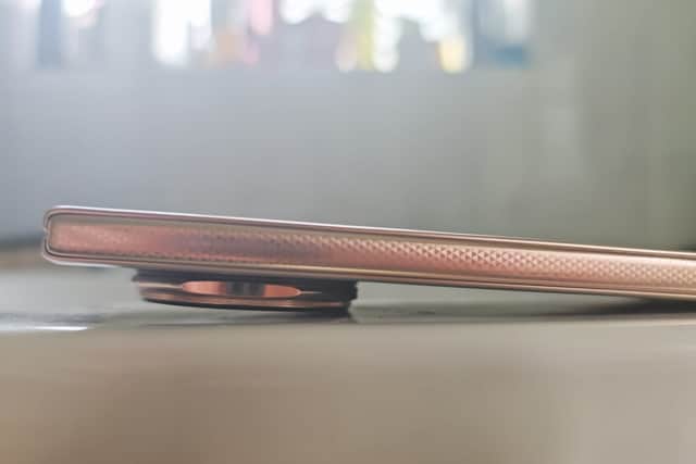 The bump makes it sit awkwardly on surfaces - especially when it's partially folded