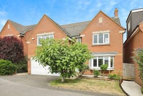 The attractive detached house has four bedrooms