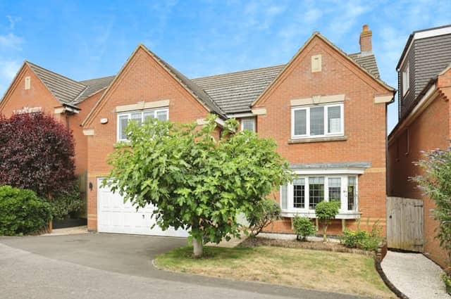 The attractive detached house has four bedrooms