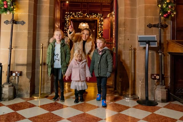 Families are welcomed into Warwick Castle for a Christmas experience filled with festive decorations, lights and surprises around every corner