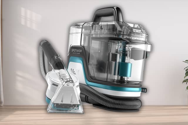 The Vax SpotWash Home Pet-Design features a compact portable body, long-reach hose and specialist SpinScrub tool for tackling stains on carpets, upholstery and car interiors