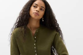 M&S Ruffle Crew Neck Cardigan. Pictured is the dark khaki colour.