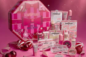 The Soap & Glory Unwrap The Magic Within 24 Piece Advent Calendar contains 24 beauty and pampering treats.