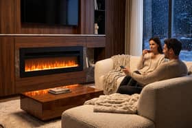 The electric fireplace offers 12 flame colours, five brightness levels and two heat settings