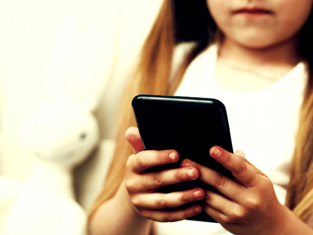 A first phone brings independence, alongside new conversations about what children can access online
