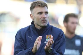 Chris Hogg applauds the away fans at York 