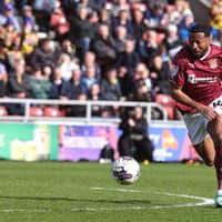 Former Cobblers defender Ali Koiki signs for new club
