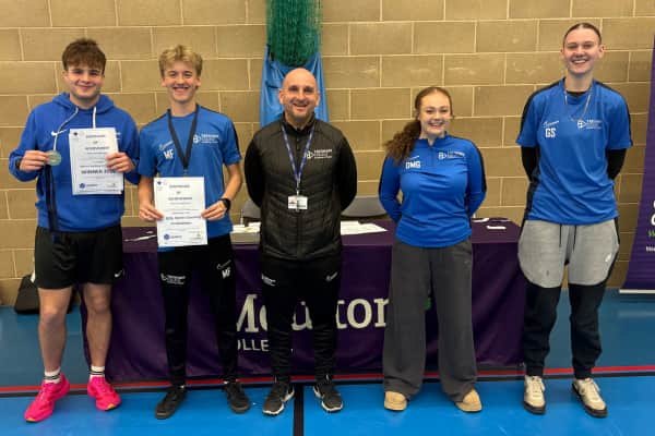Tresham College students receiving their awards