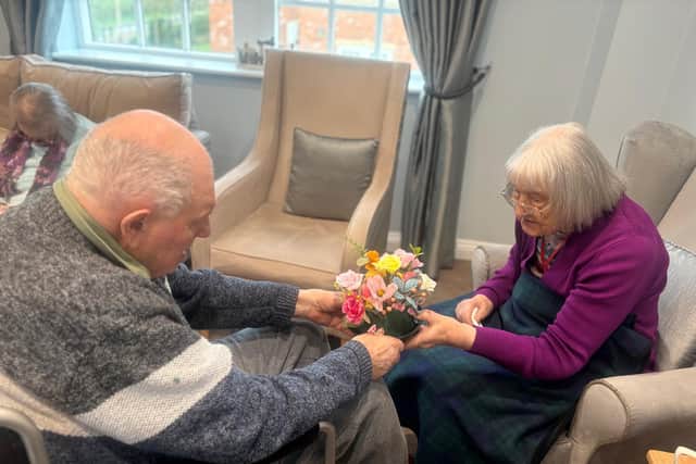 Fred presents Margaret with his beautiful creation at Brampton View Care Home