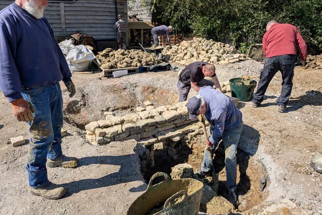 The kiln is being constructed using locally sourced materials.