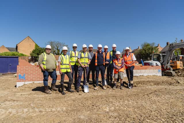 Partners from Northamptonshire Rural Housing Association, emh, Kings Cliffe Parish Council, North Northamptonshire Council, Snowdon Homes, and CPC Project Services mark the start of development of 10 new affordable homes in Kings Cliffe.