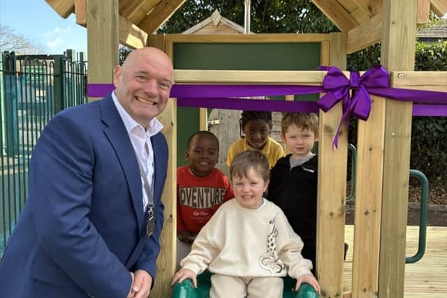Wayne Norrie OBE, CEO of Greenwood Academies Trust, with pupils from Danesholme Infant Academy