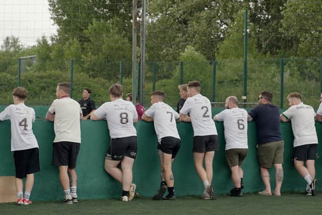 One football team watches the action at Silverstone Soccer