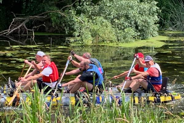 Built for speed… hopefully. Competitors give it everything they’ve got as the homemade raft race gets underway at Olney Riverfest 2026.