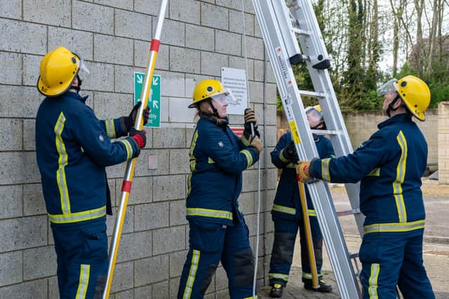 Fire Cadets complete a ladder drill