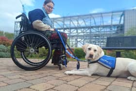 Megan Green with newly-qualified support dog Lyra 
