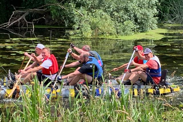Powering down the river to the roar of the crowds cheering them on