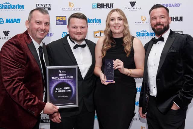 The Pro Tiler Tools team collecting their award.