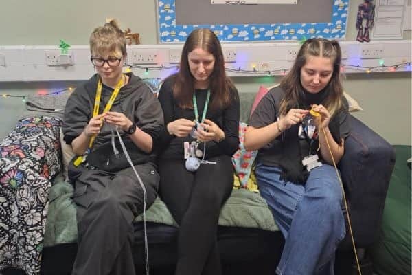 Students from Tresham College's Haven Hat Collective create handmade hats for Kettering General Hospital's Neonatal Unit and local community initiatives.