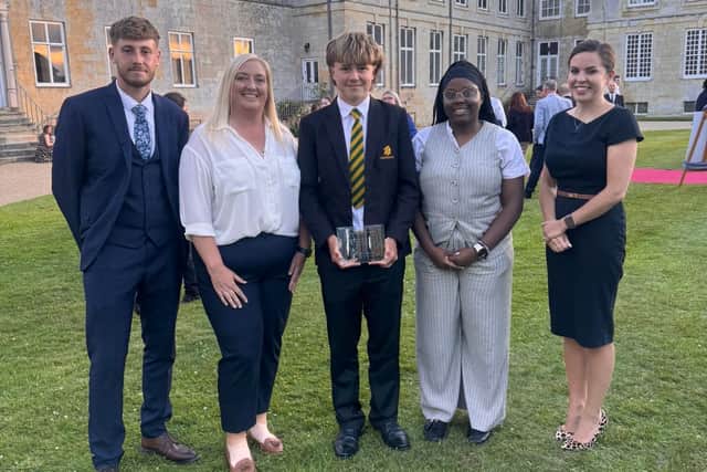 Campbell with his teachers and principal Kim Bradley-Smith
