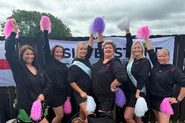 The Qweens cheered on the participants