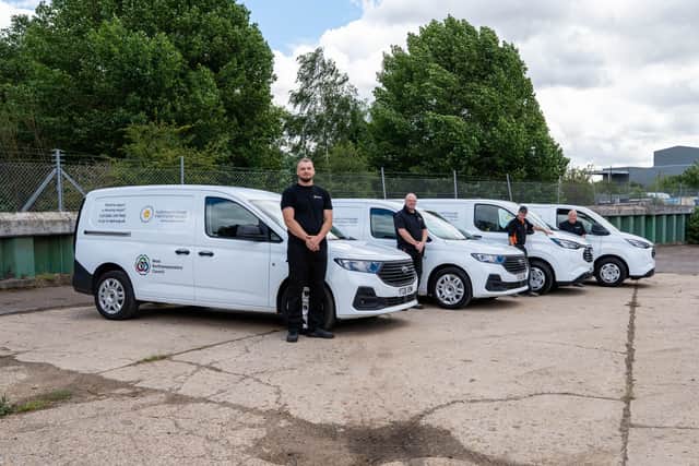 NPH Trades colleagues with a selection of vans from the new fleet