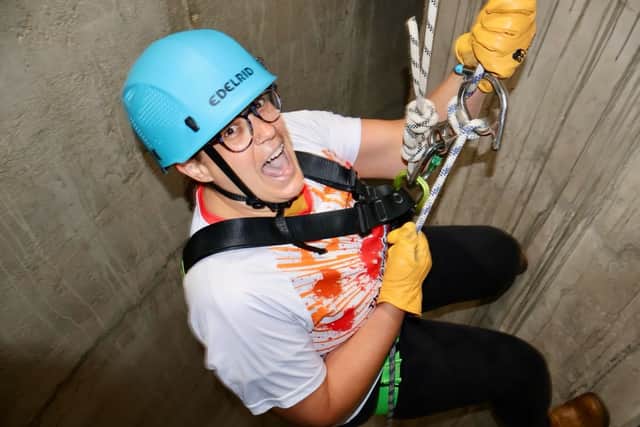Braving the 400ft abseil for The Lewis Foundation