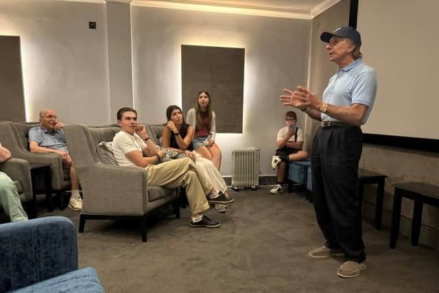 Emerson Fittipaldi sharing highlights from his racing career, in the evening after spending a busy day at The British Grand Prix.
