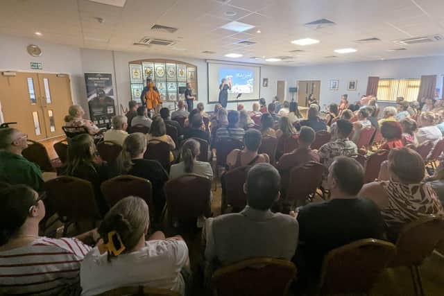 Deaf First audiences gather at Freemasons' Hall, Northampton, for Michael Woods' emotional Everest presentation.