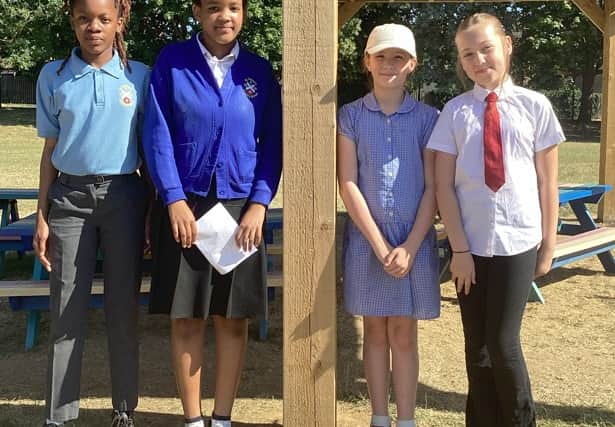 Year 6 House Captains with the outside learning classroom.