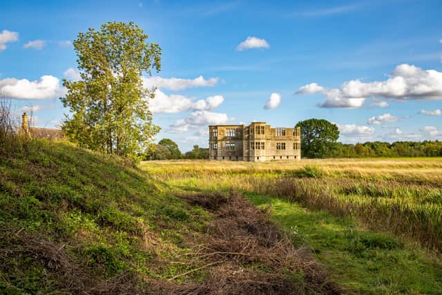 View of the unfinished Elizabethan Lodge across the park at Lyveden, Northamptonshire