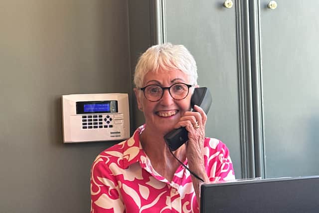 Joan and her warm smile working at Seckingtons