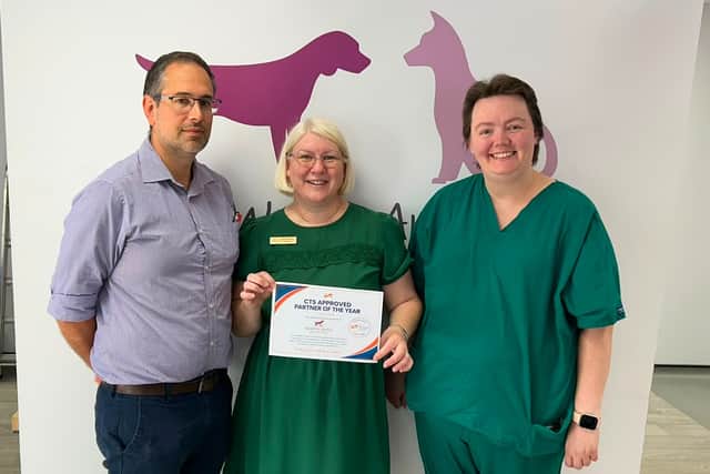 Northlands Veterinary Group team members Hans van der Hoven, Julie Walker and Nicola Case with the certificate from Corby Technical School.