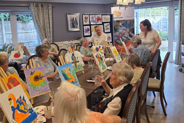 A cross section of participants at the Sip & Paint session
