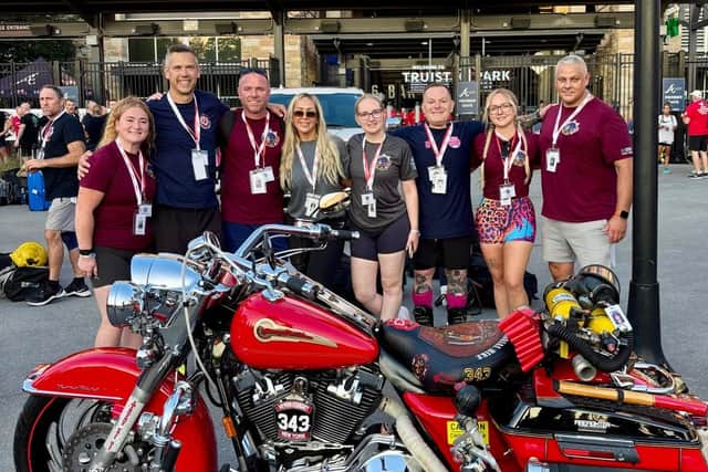 The team of eight firefighters were in Atlanta for three days. 