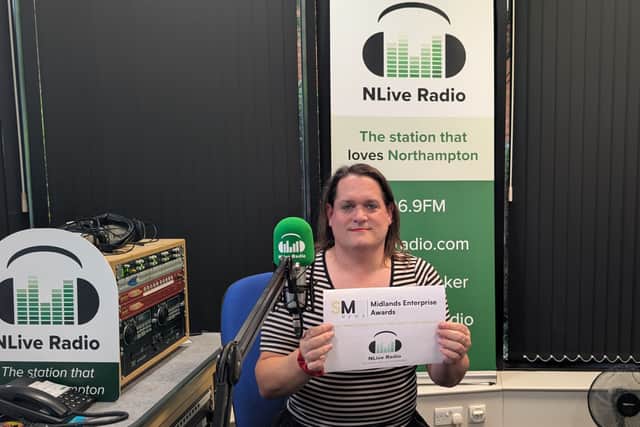 Station Manager Rebecca Steers in studio celebrating winning local radio station of the year