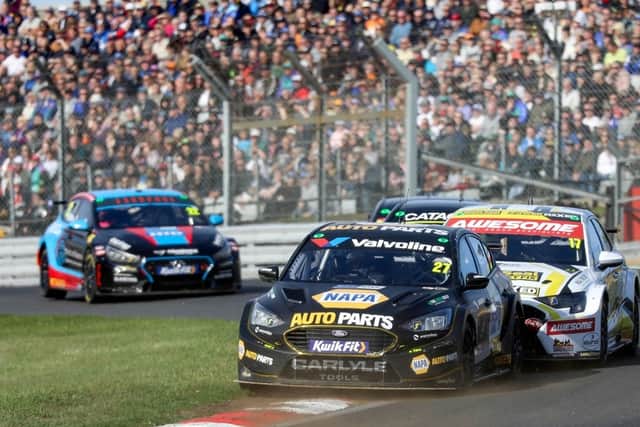 Race 3: Dan Cammish took the chequered flag in his NAPA Racing UK Ford Focus Titanium after 18 laps of the Grand Prix circuit