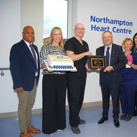 The Northampton Heart Centre team receive a plaque from Medtronic’s Vice President of Pacing Therapies, Nicolas Pivert, on their designation as a centre of excellence.