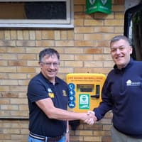 The heartbeat of the community - life-saving defibrillator installed, thanks to DJH Ravcon