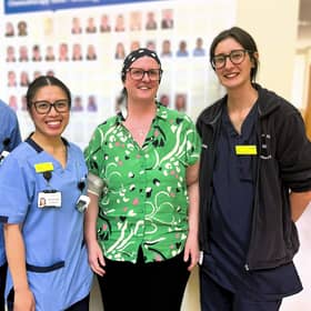 Susan Royse (wearing green) with some of the chemotherapy team who cared for her.