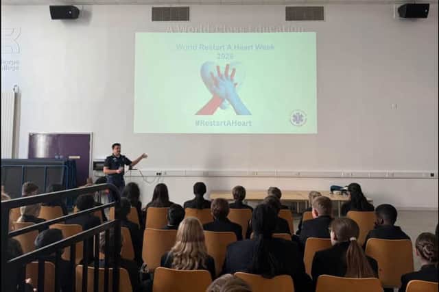Students infront of the presentation.