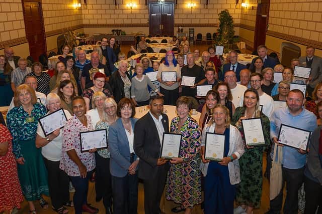 Community groups from across the town receiving their ‘It’s Your Neighbourhood’ awards at the Guildhall (Stu Vincent Photography)